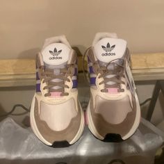 Unisex Brand New Multi Colored Adidas Tan/Beige,Purple,Pink With A White Sole Sporty Purple Adidas Sneakers, Adidas Purple Sporty Running Shoes, Casual Purple Adidas Sneakers, Adidas Pink Sneakers With Air Cushioning, Adidas Purple Lace-up Running Shoes, Casual Purple Adidas Running Shoes, Casual Purple Sneakers With Air Max Cushioning, Casual Purple Running Shoes For Streetwear, Casual Purple Running Shoes With Cushioned Footbed