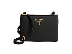 This cute and practical everyday crossbody Prada bag is the perfect accessory to add luxury to any everyday outfit. The double zipper with a center compartment dividing the two zipper pockets give the added feature of tons of space in a small compact crossbody style bag. The color of this bag is beautiful and classic, which makes this the perfect neutral bag for your handbag collection.      Model: 1BH046  Black Vitello Phenix Leather  Adjustable and Detachable crossbody strap  Gold-tone hardwar Luxury Crossbody Bag With Metal Zipper, Luxury Black Bags With Metal Zipper, Travel Crossbody Bag With Metal Zipper, Evening Crossbody Bag With Metal Zipper, School Trends, Yellow Watches, Neutral Bag, Michael Kors Fashion, Handbag Collection