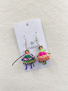 Step up your style game with a touch of Andean-Bolivian flair! Our unique Parejita Earrings feature "cholitas and cholitos" handmade with thread and love. Show off this fun style with these one-of-a-kind couples. Add a little fun and color to any look! Handmade in Bolivia. Love Show, Boy Boy, Fun Style, Bolivia, Show Off, Step Up, Your Style, Cool Style, Thread