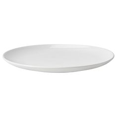 an empty white plate on a white background