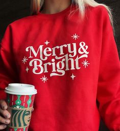 Merry and Bright Christmas Holiday Sweatshirt!!  ------------------------------------------------------------------ **Product Description** Unisex Gildan Hoodie/Crewneck: - The brand for our hoodie is Gildan. 50/50 preshrunk cotton/polyester. **How to Order** -Pick your size along with choosing either CREWNECK or HOODIE -Pick what color you would like in the sweatshirt -Go to personalization box and let me know what color vinyl you would like on your sweatshirt or simply say you would like it li Merry And Bright Sweatshirt, Red Christmas Sweatshirt, Red Christmas Holiday Sweatshirt, Holiday Letter Print Sweatshirt, Red Christmas Sweatshirt With Letter Print, Red Letter Print Christmas Sweatshirt, Red Christmas Sweatshirt Gift, Red Christmas Letter Print Sweatshirt, Christmas Crew Neck Sweater With Letter Print