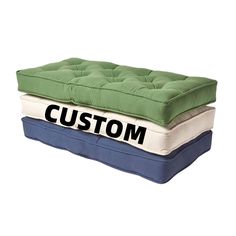 two mattresses with the word custom printed on them