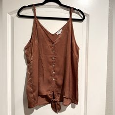 Brand New Without Tags! Shimmery Tank With Adjustable Straps And Full Button Up. Chic Vacation Tops With Button Closure, Chic Tops With Button Closure For Vacation, Rayon V-neck Top With Button Closure, Chic Rayon Tops With Buttons, Brown Button-up Vacation Tops, Summer Brown Button-up Tops, Brown Button-up Summer Tops, Spring Cami Top With Buttons, Brown Summer Tops With Buttons