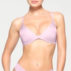 Flattering Plunge Neckline, Push-Up Foam Pads That Offer A Supportive Lift, Wireless For Maximum Comfort, Wide Wing For Extra Smoothing, Tonal Silicone Printed Skims Logo On Front Wing, Hook And Eye Back Closure 84% Polyamide / 16% Elastane Hand Wash Cold, Non Chlorine Bleach, Do Not Wring, Dry Flat, Do Not Iron, Do Not Dry Clean Imported Nwt Fitted V-neck Bra With Soft Touch, Feminine Fitted V-neck Bra, Feminine V-neck Fitted Bra, Low-cut Lined Bra, Super Push Up, Plunge Bra, Jelly Shoes, Push Up Bra, Walker Boots