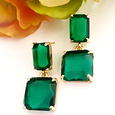 Gorgeous transparent shade of  semi deep translucent green - perfect to wear day or night.   A very  Modern Retro 70s vibe. Multi faceted crystal glass, set on 14K gold plated brass setting they're carefully well made, easy to wear  and great for any occasion  Measurement:  1 3/4" long from the top of the post  Material:            14K gold plated brass, transparent green crystal Post:                   Transparent crystal, Stainless Steel  **FREE STANDARD SHIPPING on all items in the US  All items are shipped in gift boxes to insure safe arrival💔 Green Drop Earrings For Evening, Trendy Green Earrings For Evening, Boho Crystal, Retro 70s, Crystal Drop Earrings, Square Earrings, Emerald Earrings, Crystal Drop, Faceted Crystal