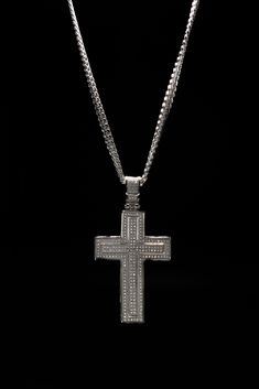 PRODUCT FEATURES: 316 High-Grade Stainless Steel Cuban Chain 3 3/4'' Long 2'' Wide .5'' Depth Lobster Clasp 100% Tarnish Free Water-Resistant Designer's Notes: The Stainless Steel Double Cross Pendant Necklace features Austrian Crystals and a cross within a cross design. This unique design adds depth and illusion to this pendant. The Double Cross Necklace takes your rockstar style to the next level holding its own in your statement necklace collection. The Double Cross would look incredible on i Elegant Iced Out Cross Pendant Jewelry, Formal Iced-out Pendant Necklace, Formal Cross Pendant Jewelry With Chain, White Gold Cross Chain Jewelry, Double Cross Necklace, Rockstar Style, Necklace Collection, Cross Design, Timor Leste