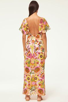 Our lovely Lalita maxi dress is cut from a groovy floral print chiffon. A bateau neckline with short sleeves is offset by a low cut back. Show a little leg with a side split. Concealed zip closure. Pair with simple flat sandals for a dress you'll turn to all summer long. Made in the USADry Clean100% Cotton Model Measurements: Height 5'9", Waist 24.5, Bust 32, Hips 35Model is wearing size XS Mesh Jumpsuit, Matching Separates, Floral Print Chiffon, Poplin Dress, Home Dress, Bateau Neckline, Summer Set, Long Sleeve Jersey, White Party