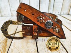 Welcome to our Etsy shop! This exquisite handmade light brown leather belt is a true testament to the craftsmanship of Ishaor. With its unique design, this belt captures the essence of the Western style, adding a touch of rugged charm to any outfit. Adorned with meticulously placed gold and silver rivets, this belt truly stands out from the rest. The combination of these elegant embellishments with the addition of silver coins creates a stunning visual appeal that sets this belt apart from traditional designs. Crafted from high-quality light brown leather, this belt not only exudes durability but also offers a comfortable fit that will last for years to come. The leather has been carefully selected for its supple texture and rich color, ensuring that it ages beautifully with time, adding c Handmade Belts, Light Brown Leather, Belt Design, Design Light, Brown Leather Belt, Brown Belt, Silver Coin, Nice Leather, Leather Belts