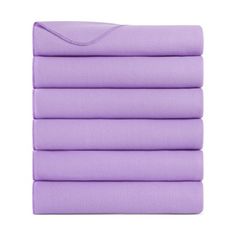 purple sheet set with four sheets folded on top of each other, in front of a white