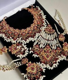 Nauratan necklace set Bollywood Style Gold Plated Necklaces For Wedding, Bollywood Style Gold Plated Necklace For Wedding, Gold Plated Bollywood Style Necklace For Wedding, Ornate White Jewelry For Festive Occasions, White Bollywood Jewelry For Marriage, Gold Plated Bridal Necklace With Stone Work, Temple Jewelry Chandbali For Wedding, Temple Jewelry Style Necklaces With Jewels For Weddings, Gold Plated Meenakari Jewelry For Wedding