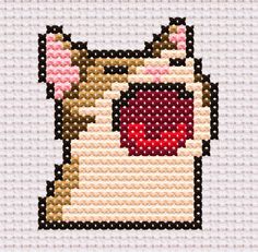 a cross stitch pattern of a dog with its mouth open and tongue out in front of it