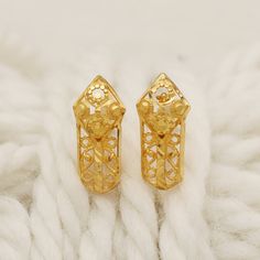 Please click -- Learn more about this item -- below for a full description 22k gold earrings handmade jewelry made in India length is 1.4 centimeter and 0.6 centimeter width approx. weight is 1.79 grams approx. please message me if you want real gold screw/backs. Festive 22k Yellow Gold Earrings, 22k Gold Filigree Earrings, Traditional 22k Yellow Gold Earrings, 22k Gold Earrings With Intricate Design For Ceremonial Occasion, Ceremonial 22k Gold Earrings With Intricate Design, Traditional 14k Gold Earrings, 22k Gold Hoop Earrings With Intricate Design For Festivals, 22k Yellow Gold Filigree Earrings, Ceremonial 22k Gold Filigree Earrings