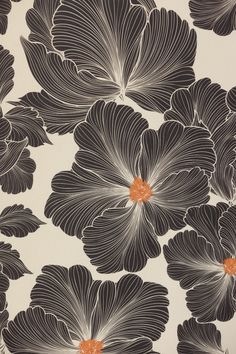 black and white flowers with orange centers on a wallpapered background in an old fashion style