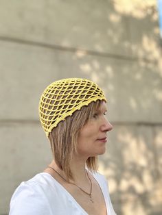 This is yellow mesh/net beanie hat Boho style. Soft Cotton lace crocheted summer hat handmade. Scull cap lace beanie hat. Retro style mesh beanie hat is very versatile and will be an essential trendy hair accessory for you. This hat is soft to the touch and gentle on your skin. Shown in yellow color fits head circumference 57-58cm. Height/length of the cap 18cm. Shown in milky white color fits head circumference 55-56cm.  Height/length of the cap 17cm. The circumference of the model's head is 56 cm. Material - 100% cotton. Custom color or size available upon request. The actual colors vary due to your computer or your mobile phone resolution and display color restrictions. Made in a 100% Smoke-Free and Pets-Free home. Handmade Recommended care: NO machine wash! Hand wash only with a mild d Yellow Knitted Crochet Hat For Spring, Yellow Crochet Hat For Spring, Yellow Crochet Cap Hat, Yellow Crochet Yarn Cap, Casual Yellow Crochet Beanie, Yellow Adjustable Crochet Cap, Yellow Yarn Crochet Cap, Casual Yellow Crochet Beanie Hat, Adjustable Yellow Crochet Cap