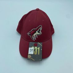 About this item Condition: Used: Seller Notes: “Pre-owned item small stain inner lining” Brand: Reebok well know American fitness and footwear and clothing manufacturer, specializing in sports goods including jersey, hats, caps Player: Team Size: S - M Country/Region of Manufacture: Bangladesh Sport: Hockey-NHL Team: Arizona Coyotes professional ice hockey team based out in Phoenix metropolitan area. It competes in National Hockey League Pre & Post Season: Regular Season Product: Cap, Hat Gender Sporty Baseball Cap For Winter Sports, Sporty Winter Baseball Cap For Sports, Sporty Winter Baseball Cap, Ice Hockey Teams, Arizona Coyotes, Vintage Reebok, Clothing Manufacturer, Nhl Hockey, National Hockey League