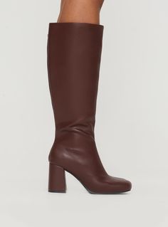 Knee high boots Leather material, zip fastening at side, rounded toe, padded footbed, block heel Upper, lining & insole: 100% PU Heel height: 8cm / 3.1in Brown Knee-high Heeled Boots With Zipper, Brown Knee-high Heeled Boots With Zipper Closure, Faux Leather Block Heel Boots With Zipper, Faux Leather Heeled Boots With Zipper And Block Heel, Knee-high Boots With Padded Block Heel For Work, Winter Wide Calf Knee-high Boots With Padded Heel, Workwear Knee-high Boots With Padded Block Heel, Winter Platform Boots With Padded Block Heel, Round Toe Heeled Boots With Zipper For Work