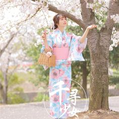 This Pink and Blue Floral Yukata with Pink Obi is a stunning traditional Japanese garment that's perfect for a variety of occasions. The yukata features a beautiful floral pattern in pink and blue hues, adding a touch of elegance to any outfit. The pink obi adds a charming accent and ties the look together. Made from high-quality materials, this yukata is comfortable to wear and durable. Whether you're attending a summer festival, hosting a dinner party, or simply lounging at home, this Pink and Women Formals, Japanese Outfits, Summer Festival, Dress Robes, Blue Hues, Vintage Japanese, Traditional Outfits, Japanese Traditional, Cosplay Costumes