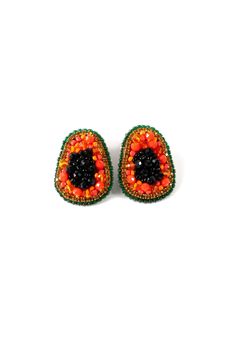 "These vibrant eye-catching earrings are adorned with green colorful beading. Adding a touch of playfulness and elegance to any outfit. Made with high quality material and attention to detail our Avocado Earrings are perfect statement piece to express your unique personality.  These earrings are 100% handmade with so much love to help you add unique pieces to your collection. * Lightweight  * Stud earrings * Push back * Hand beaded  DETAILS Measurements: Length 3\" Width 2\" Weight of each earring 0.12 oz 🫧 HEAD TO OUR WEBSITE FOR MORE 📲 shopandreamboutique.com All artisan earrings are handmade with love and care. Each pair of earrings are unique and one of a kind. Since each piece is handmade, each pair may vary in color and appearance and may not match the picture exactly. PROCESSING T Green Teardrop Beaded Earrings For Party, Unique Multicolor Beaded Earrings For Party, Unique Green Beaded Earrings For Party, Unique Green Beaded Party Earrings, Handmade Multicolor Crystal Earrings For Party, Multicolor Beaded Crystal Earrings For Party, Unique Colorful Beaded Earrings For Party, Unique Colorful Beaded Party Earrings, Multicolor Beaded Drop Clip-on Earrings