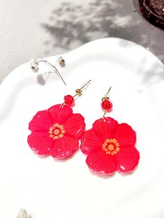 Handmade single poppy flower dangle earrings with glass beads, feminine pop style, big flower earrings. 🌺 Color options: Red, Orange, Pink, Peach 🌺 Material: pencil-drawn shrink plastic with resin on the surface. Stainless steel stud, and glass bead. 🌺 Making time: 1.5-2 hours 🌺 Size: Flower diameter: 36mm-40mm,       Length: 50mm(with gold-plated ball earring stud),       or 67mm(with gold-plated earrings hook) Red Flower Charm Earrings, Red Flower Earrings With Ear Wire, Rose Red Flower Earrings, Red Flower Shaped Jewelry For Summer, Red Flower-shaped Jewelry For Summer, Red Flower Jewelry For Summer, Red Flower-shaped Summer Jewelry, Summer Flower Shaped Red Jewelry, Summer Red Flower-shaped Jewelry