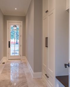 the hallway is clean and ready for us to use in this home's new addition