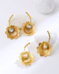 Statement stud earring gold for women. Suitable for Party wear, designer earring made in Top quality Italian brass, very durable gold plating, non-allergic and anti tarnish. Designer earring with pearl and polki option. Festive Gold-plated Gold Earrings, Festive Gold Hoop Earrings With Pearl Drop, Gold Plated Pearl Drop Temple Earrings, Elegant Brass Danglers For Diwali, Festive Gold Plated Pearl Earrings For Pierced Ears, Gold Chandbali Pearl Earrings For Party, Gold-plated Pearl Drop Danglers, Gold Drop Flower Earrings For Festive Occasions, Yellow Gold Metal Earrings For Festive Occasions