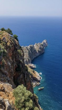 an ocean view from the top of a cliff