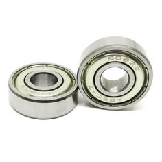 two ball bearing units on a white background