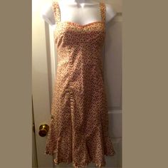 This Is A Stunning Nanette Lepore Dress. It Has A Pink Floral Material, A Lined Bust, Side Zip Closure And The Straps Adjust To Crisscross Or Regular Style. A Stunning Dress. Hits At Or Above The Knee. New Without Tags. Sz: 6 Chest Flat: 15" Waist Flat: 14" Total Length: 27" 97 Cotton 3 Spandex Bin 69 Fitted Sundress With Sweetheart Neckline For Daywear, Fitted Sundress With Ditsy Floral Print, Fitted Ditsy Floral Print Sundress, Feminine Fitted Cotton Sundress, Fitted Feminine Cotton Sundress, Pink Fitted Knee-length Sundress, Pink Sleeveless Dress With Ditsy Floral Print, Pink Fitted Sundress With Sweetheart Neckline, Pink Fitted Lined Sundress