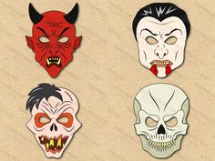 four different colored masks with fangs and demon heads on top of each mask, all in different colors