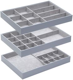 three gray trays with compartments on each side