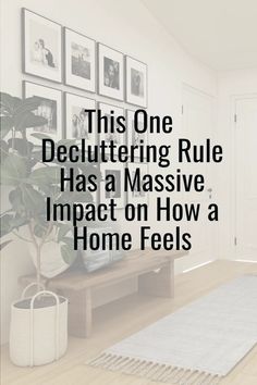 a living room with pictures on the wall and a rug in front of it that says, this one decluttering rules has a massive impact on how a home feels