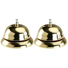 two brass bell bells on a white background