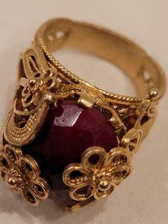 In beautiful vintage (used) condition. Clearly stamped. Gold over sterling Filigree setting with a large ruby. Please look at the pictures for details and condition or message me with any questions Ruby Ring, Ethnic Jewelry, Link Necklace, Gold Beads, Rings Statement, Statement Rings, Lion, Ruby, Jewelry Rings