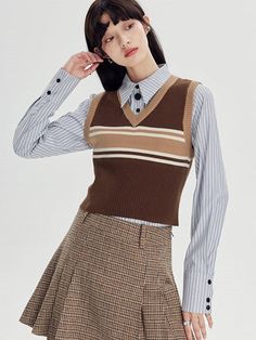 Material: Polyester30.2%  Cellulose fiber23.2% Acrylic25.6% Nylon21%  Size: SM   Model: 167cm/49kg 　  Length Bust Shoulder S 42cm 75cm 33cm M 43cm 79cm 34cm Trendy Knit Vest For Fall, Brown Knit Sweater Vest For Work, Beige Ribbed Sweater Vest For Fall, Trendy Ribbed Sweater Vest For Fall, Chic Fitted Brown Sweater Vest, Chic Brown Fitted Sweater Vest, Fitted Chic Brown Sweater Vest, Fitted Sweater Vest For Winter Layering, Knitted Brown Sweater Vest For Spring