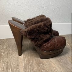 Brown Clogs By Christian Dior. Silver-Tone Studs. They Have A Wooden 5.5" Heel And A 1.25" Platform. Excellent Condition *Comes With No Box* Brown Clogs, Dior Shoes, Brown Silver, Mule Clogs, Mules Shoes, Christian Dior, Clogs, Silver Tone, Dior