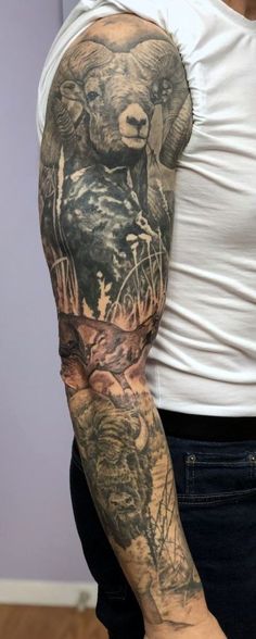 a man with a bear tattoo on his arm