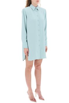 MVP Wardrobe mini shirt dress crafted in technical cady. Design with padded shoulders and back yoke with side pleats featuring pointed collar, front button fastening, long sleeves with double-button cuffs and rounded slits on sides. Relaxed fit with straight cut. The model is 177 cm tall and wears size IT 38. Size Info IT Color Detail Light blue Made In Italy Material 100%PL Season One spring Season Two summer Product clothing Brand MVP Wardrobe Size And Fit Latest Fashion Design, Cape Coat, Dress Crafts, Malene Birger, Mini Shirt Dress, Pant Shirt, Straight Cut, Jeans Dress, Dresses For Sale