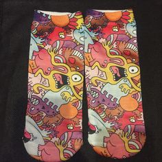 This Colorful Pair Socks Are A Fun Wear! One Size Fits Most! This Unique Pair Is A Wonderful Addition To Your Wardrobe And Your Style; Sure To Get Lots Of Compliments! Fun Multicolor Socks For Gifts, Cute Multicolor Socks For Gifts, Multicolor Casual Socks For Gift, Fun Multicolor Stretch Socks, Casual Multicolor Socks For Gifts, Casual Multicolor Cartoon Print Socks, Fun Pink Socks For Stocking Stuffers, Casual Stretch Socks For Stocking Stuffers, Casual Purple Socks As Gift