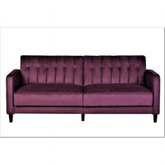 a purple couch sitting on top of a white floor