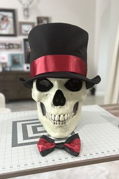 Make your 12 foot Skelly ready for that Valentine date, New Years's Eve, a birthday, a black tie affair or an honorary groomsman at your wedding!  This felt black top hat is designed to snuggly fit the 12 foot skeleton and finished off with a satin hat band. The satin bow tie has an elastic band to perfectly fit the Skelly's neck. 🇱🇷 A PORTION OF THE PROCEEDS OF THIS SALE WILL BE DONATED TO TUNNEL TO TOWERS 🇱🇷 Since 9/11, Tunnel to Towers has been helping America's heroes by providing mortga Honorary Groomsman, Fitted Mini Hats For Themed Events, Black Formal Hats For Halloween, Adjustable Black Hat For Themed Events, Black Adjustable Hat For Themed Events, Black Top Hat For Themed Events, Black Adjustable Top Hat For Costume Party, Fitted Costume Accessories With Short Brim For Costume Party, Black Fitted Top Hat For Themed Events