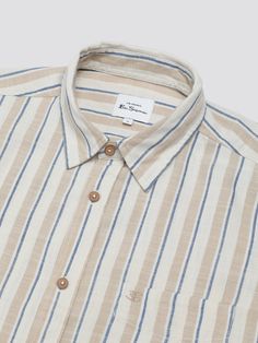 This mod stripe shirt features a curved hem and casual point collar. Made from 100% cotton, this classic fit shirt is completed with a ‘B’ embroidery on the chest pocket. 100% COTTON 40 DEGREE WASH WASH DARK COLORS SEPARATELY MEDIUM IRON Striped Shirt With Pockets And Spread Collar, Striped Cotton Shirt With Placket, Casual Shirt With Striped Spread Collar, Cotton Shirt With Striped Spread Collar, Stripe Shirt, Dark Colors, Striped Shirt, Mens Tees, Chest Pocket