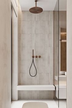 a bathroom with a bathtub and shower head