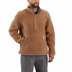 Made to layer, this men's fleece pullover is cut with a loose fit for ample room to move. It's crafted in soft fleece for warmth and comfort through work days and outdoor adventures. A drawcord hem can be adjusted to seal out cold air. Features 9.7-ounce 100% polyester fleece Loose fit Quarter-zip front Elastic cuffs for a snug fit Front handwarmer pocket Reinforced lower-front pockets with zipper closure Model height 6'1"; Wearing size M Country of Origin: Imported | Carhartt Men's Polyester Lo Mens Fleece, Clothing Essentials, Cold Air, Workout Jacket, Shop Sweatshirts, Carhartt Mens, Rain Wear, Work Pants, Hand Warmers