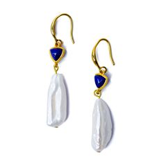 This earrings are crafted from Pearls and Lapis Lazuli. Feel uniquely special, knowing your jewelry is designed and crafted with care, imbued with a story and history that celebrates your individuality. Weave a narrative of elegance and timeless beauty, making you feel connected to something truly exquisite. 2.15" Total Length Lapis Lazuli Beads 4mm x 13mm, Semi-precious stone, From Afghanistan Freshwater Pearls 25mm x 9mm, From HangZhou China 14K Gold Plated Sterling Silver Hoop, 18mm, From Korea Handmade in Westport CT. US Free shipping and Free returns within 90 days of receipt 2-year warranty Luxury Drop Earrings With Natural Stones, Luxury Natural Stone Drop Earrings, Luxury Single Pearl Earring As Gift, Luxury Single Pearl Earring For Gift, Luxury Long Drop Earrings As Gift, Fine Jewelry Pearl Gemstone Earrings As Gift, Fine Jewelry Earrings With Natural Stones Gift, Elegant Sterling Silver Earrings With Natural Stones, Elegant Long Drop Earrings With Natural Stones