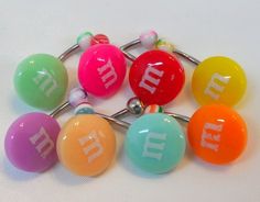 six different colored candy balls with the word fun on them in white letters and numbers