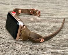 7mm Rustic Brown Genuine Leather Bracelet. Gorgeous Design Slim Leather Jewelry Tailored to Perfection. Designed And Handmade by Simeon D Jewelry Studio. This Bracelet Fits ALL Apple Watch Series. Please Measure Your Wrist Before Submitting Your Order! Not For Other Models. Apple Watch Is NOT Included. Let's be Friends! Follow my Studio on Social Media Instagram @simeondjewelry Pinterest @simeondjewelry Facebook @simeondjewelrystudio Adjustable Double Band Bracelet Strap For Watches, Adjustable Apple Watch Band For Everyday Use, Adjustable Rose Gold Bracelet Strap Apple Watch Band, Rose Gold Watch Band For Fashion Accessory, Rose Gold Watch Bands With Bracelet Strap, Adjustable Rose Gold Jewelry For Everyday Use, Adjustable Leather Strap Watch Bands, Adjustable Leather Watch Band, Adjustable Wrist Strap Watch Bands