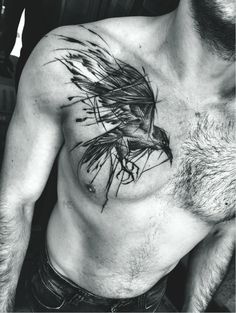 a man with a bird tattoo on his chest