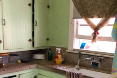 the kitchen is clean and ready to be used for cooking or cleaning up some dishes