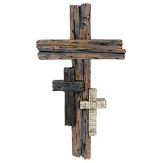 a cross made out of wooden planks on a white background