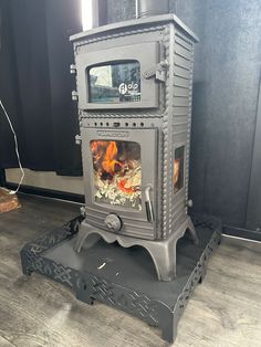 a stove that is sitting in the middle of a floor